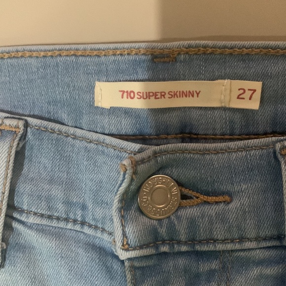 Levi’s 710 super skinny jeans. Distressed and light wash. Size 27 - Picture 3 of 4